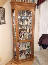 Curio cabinet with a huge selection of collectibles...Lladros and more