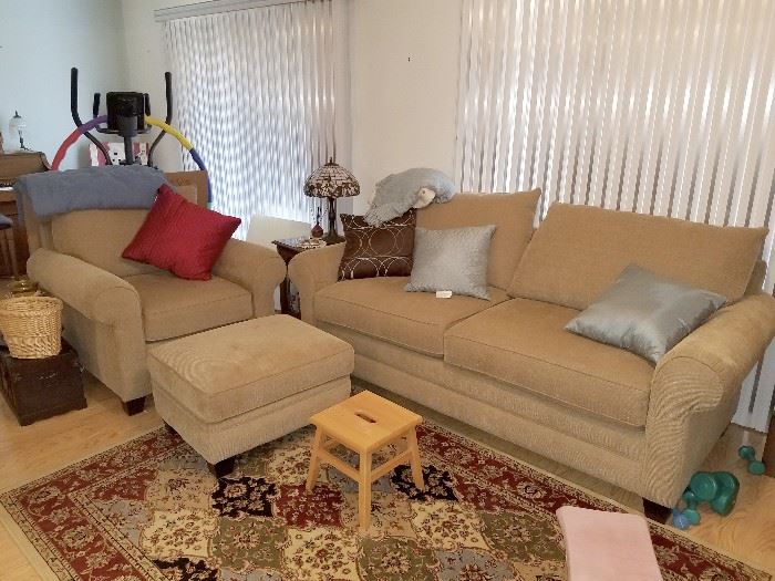 Matching beige couch, chair and ottoman