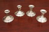 Four Candlesticks, Marked "Weighted Sterling"