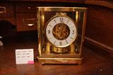 This clock was removed prior to the start of the sale by the family. Our apologies for an inconvenience.