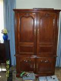 Media cabinet with slide in doors