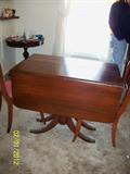 Table comes with three leaves and pads(Mahogany)