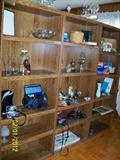 three nice shelves with stuff on them