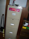 tall file with key