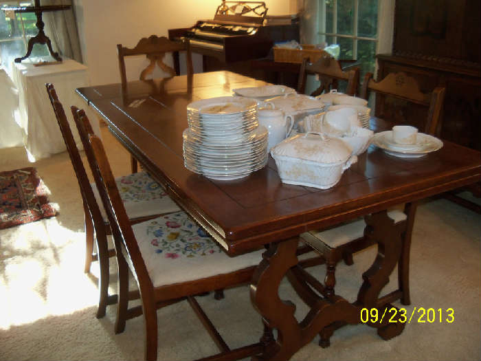 Trestle table with six chairs ( needs tlc, but priced right. )
