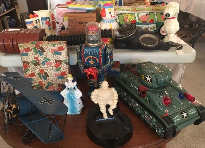 Japanese Robot by Diaya, Tank, Michelin Man Ashtray, Plane, Gas Mask 1946, Vintage Peanuts/ Charlie Brown Bus and misc!