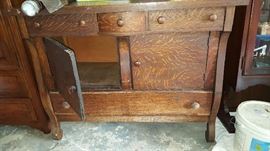 buffet table with tiger oak cabinet and drawers