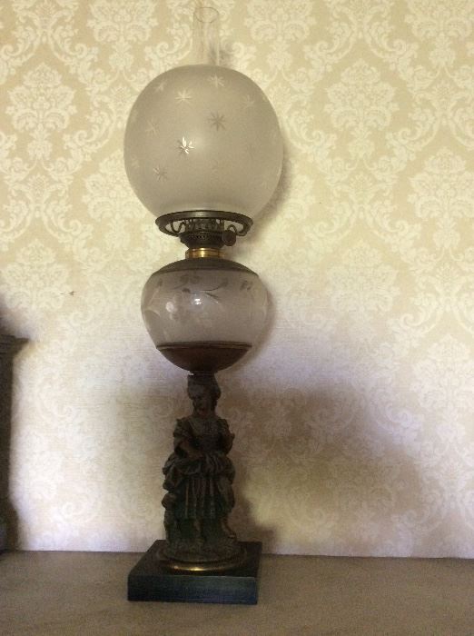 Lovely oil lamp with cast lady base. Beautiful etched, original glass. 