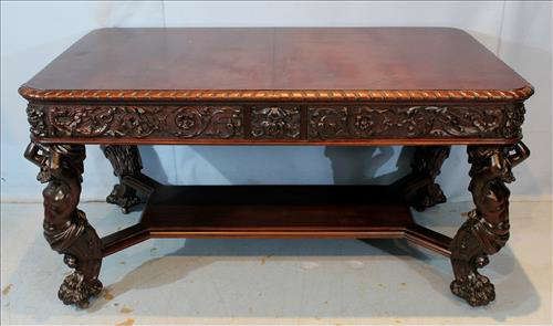 24 -  Large R,J. Horner library table with atlas figures, 31 in. T, 36 in. W, 60 in. L.