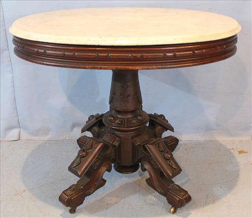 27 - Walnut Victorian marble top center table attrib. to Thomas Brooks with original finish, 30  in. T, 35.5 in. W, 27 in. D.