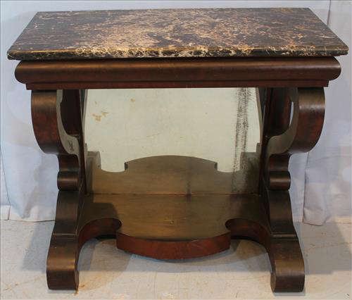 75 - Mahogany Empire pier table with black marble and mirrored back, 38 in. T, 40.5 in. W, 19 in. D.
