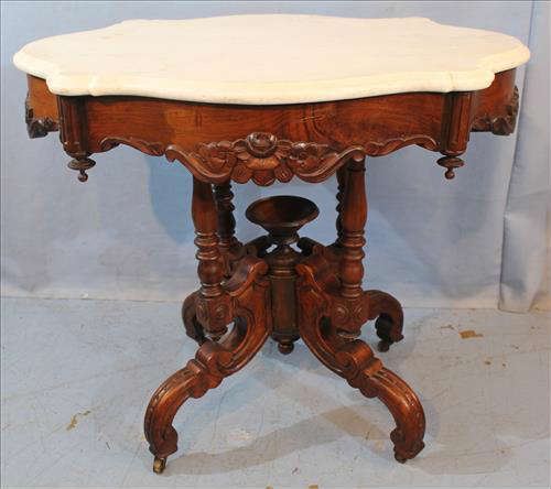 98 - Walnut Victorian marble top center table, 30 in. T, 35 in. W, 27 in. D.