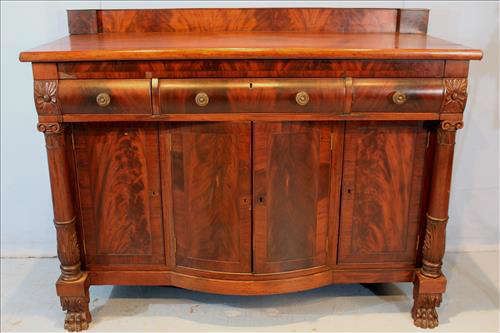 110 - Flame mahogany acanthus carved column front sideboard with original glass pulls, 3 drawers, 28 in. T, 62 in. W, 25 in. D.