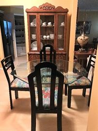Glass dinette set and china cabinet