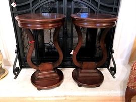 Pair of matching small round tables