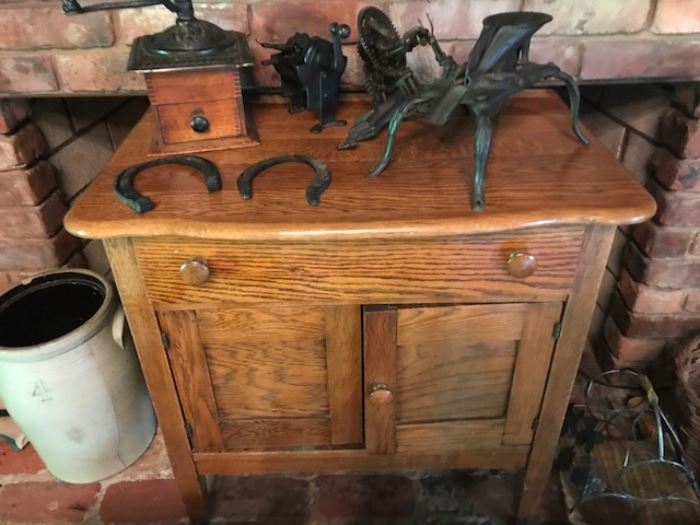 Antique wash stand, antique crock, antique juicer and apple peeler