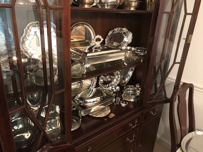 Henkel Harris china cabinet with lots of silver-plate items