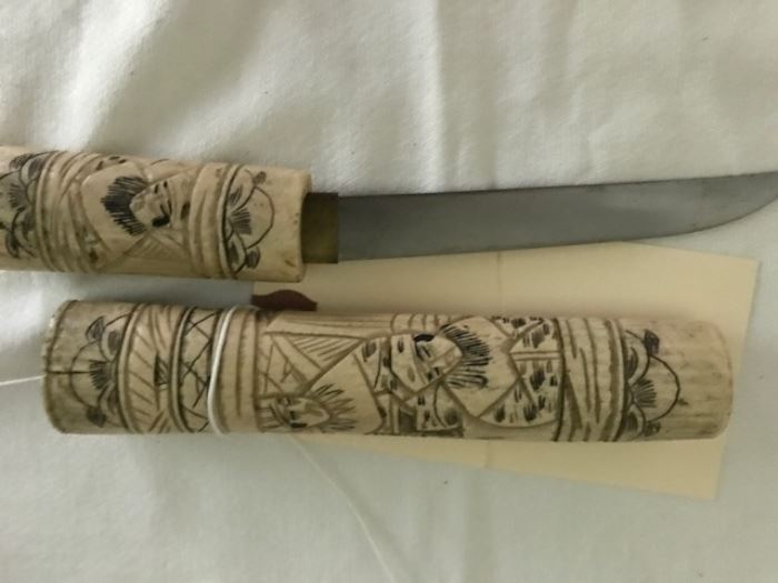 Antique Japanese bone knife and scabbard.