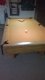 Slate Pool Table for sale with all the cues, chalk, rack, 2 sets for balls