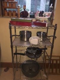 Metal shelf + pots and pans

