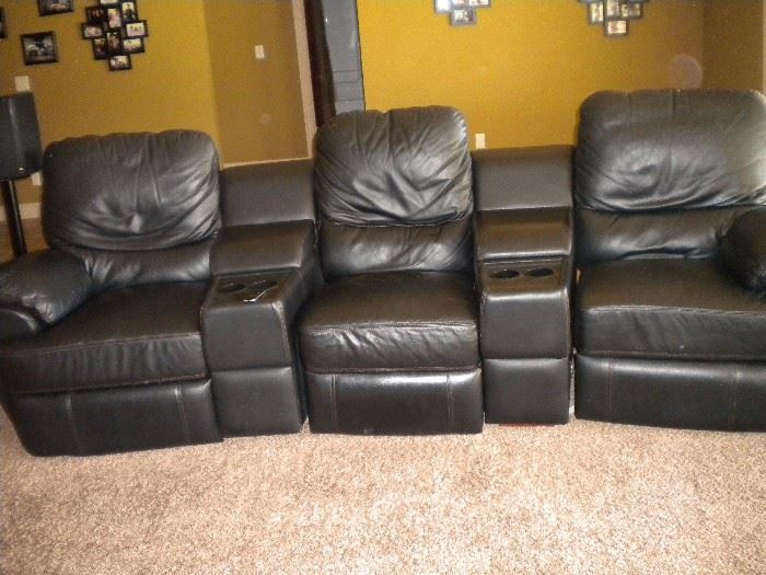 Leather reclining theater seating for 3 with storage/cup holders