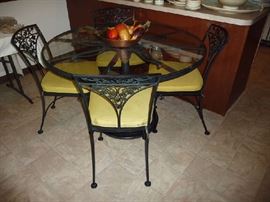 WROUGHT IRON GLASS TOP TABLE W/6 CHAIRS