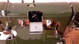 WHITE AUTOMATIC SEWING MACHINE IN CABINET