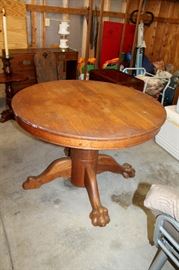 Antique round clawfoot table