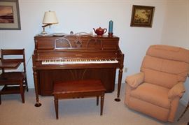 Kawai piano and La-Z-Boy upholstered recliner chair