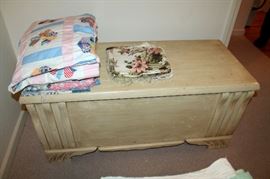 Painted cedar trunk and quilt tops