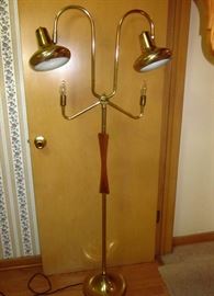 Cool mid century floor lamp with 4 lights and teakwood decoration on pole.  61-1/2" tall, 25" wide at top.