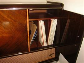 Blaupunkt Valencia Deluxe console stereo.  Mini bar with tufted walls, mirrored bottom, side storage for records, radio does not change channels, turntable works and sounds great. Cabinet in great condition.