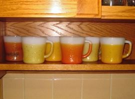 Mid century Glamalite coffee mugs.  Milk glass coated with glittered rubberized coating.