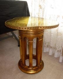 Grecian side table, very heavy, hand painted, gold leaf, glass top.  19-1/2" wide, 21-1/2" tall.