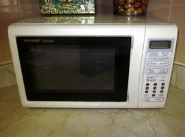 Older Sharp Carousel microwave.  Perfect working condition.