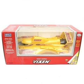 Radio Control Vixen Racing Speed Boat by Nikko: A Radio Control Vixen by Nikko. The remote control operated racing boat has a Mabuchi motor for extra fast speeds, full function forward, reverse cruising and turn and stop. The boat can be used for competitive racing. The boat is new in the orginal box, the remote operates on 9v batteries; will need a charger which are readily available online.