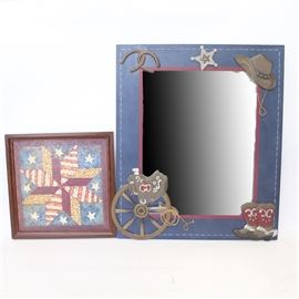 Western Themed Wall Mirror by Home Interiors Kids and Don Easterwood Print: A Western themed wall mirror by Home Interior Kids and a signed print by Don Easterwood. The rectangular mirror is framed in blue painted wood with a pair of cowboy boots, a cowboy at, horseshoes and a sheriff’s badge. The small print is of a patchwork star on a blue background with white stars. The work has a printed signature by Don Easterwood and is framed in a medium wood frame.