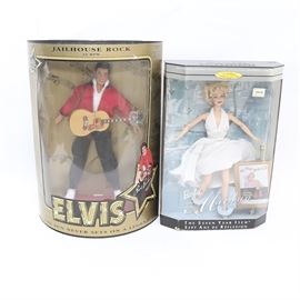 Elvis "Jailhouse Rock" Doll and Barbie as "Marilyn" in the Seven Year Itch: An Elvis Jailhouse Rock doll and Barbie as Marilyn in the Seven Year Itch. The Elvis doll was released by Hasbro in 1993 and displays Elvis in his costume for his Jailhouse Rock video with his guitar around his neck and a stand. The Marilyn Barbie is from the Hollywood Legends Collection in 1997. The doll is dressed in Marilyns famous white halter dress with crystal pleating; as in the scene from The Seven Year Itch when her dress is blown up by the subway grate. Both dolls are in the original boxes.