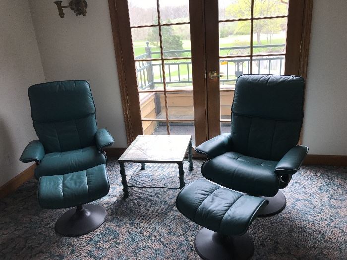 Pair of Teal  Leather Reclining  Chairs.