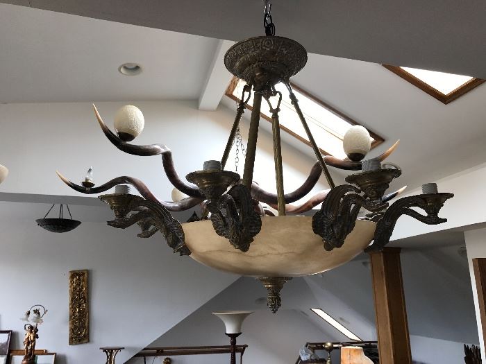 Unusual Horn, and Carved Ostrich Egg
Chandelier w Carved Elephant design underneath.