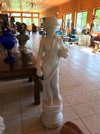 One of Four Hand Carved White Italian Marble Statues.