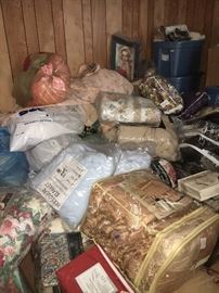 Rooms filled with unopened comforters, sheets, towels