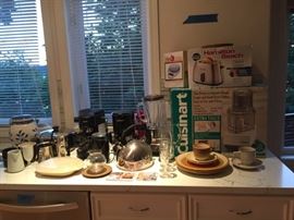 Cuisnart Food Processor, Hamilton Beach Toaster, Food Scale, Krups Espresso Machine, Cusinart Cofee Maker, Tea Pot, and more.