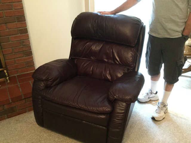 Brown leather recliner.