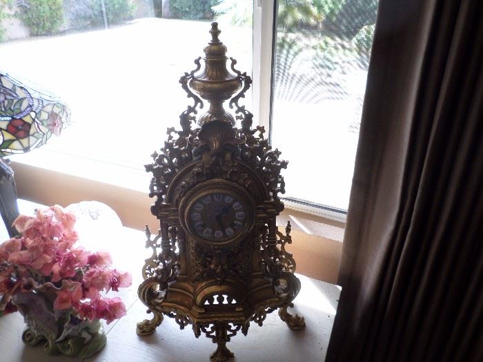 Solid brass Antique clock, porcelain face. French Design, German movement   See next picture.