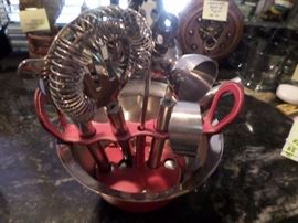 Red leather ice bucket with bar ware accessories