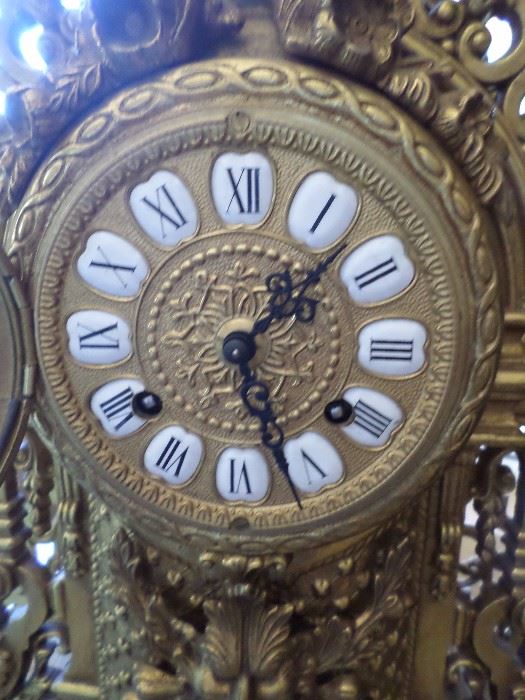Porcelain/ brass dial of solid brass clock. 
