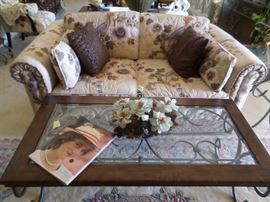 Custom loveseat $ 150, iron/wood cocktail table $ 95