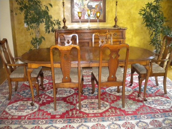 Beautiful solid wood table and 6 chairs, great neutral paisley design upholstered seats, alternate area rug available
