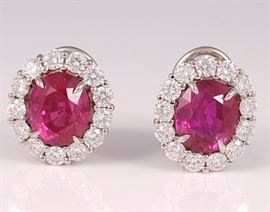 Appraised Retail Value: $220,000.   Asking: $120,000.
Platinum and 18K gold ruby earrings - 7.74 cts total weight with 26 round brilliant diamond  -1.98 carats total weight.      4.29 ct - Gubelin 9810036; 9.5 x 7.9 x 6.5mm; heated, Burma  ---  3.50 ct - Gubelin 9810037; 9.0 x 8.0 x 5.2mm; heated, Burma
AGL report# CS58630 A and B: 4.24 and 3.50 cts, TE minor residues, Burma      THIS ITEM IS IN A BANK VAULT FOR INSURANCE REASONS.  IT WILL NOT BE ON-SITE.       Call 800-289-2850 for a private  appointment to view these items.